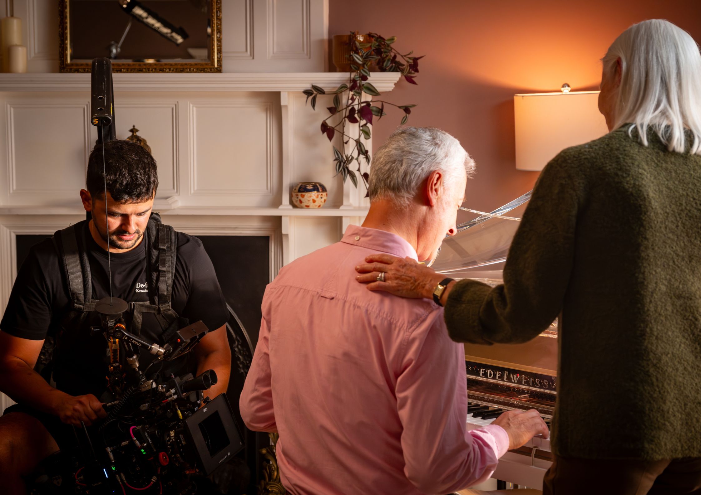 Actors playing piano on set of The Ultimate Gift at Edelweiss Pianos