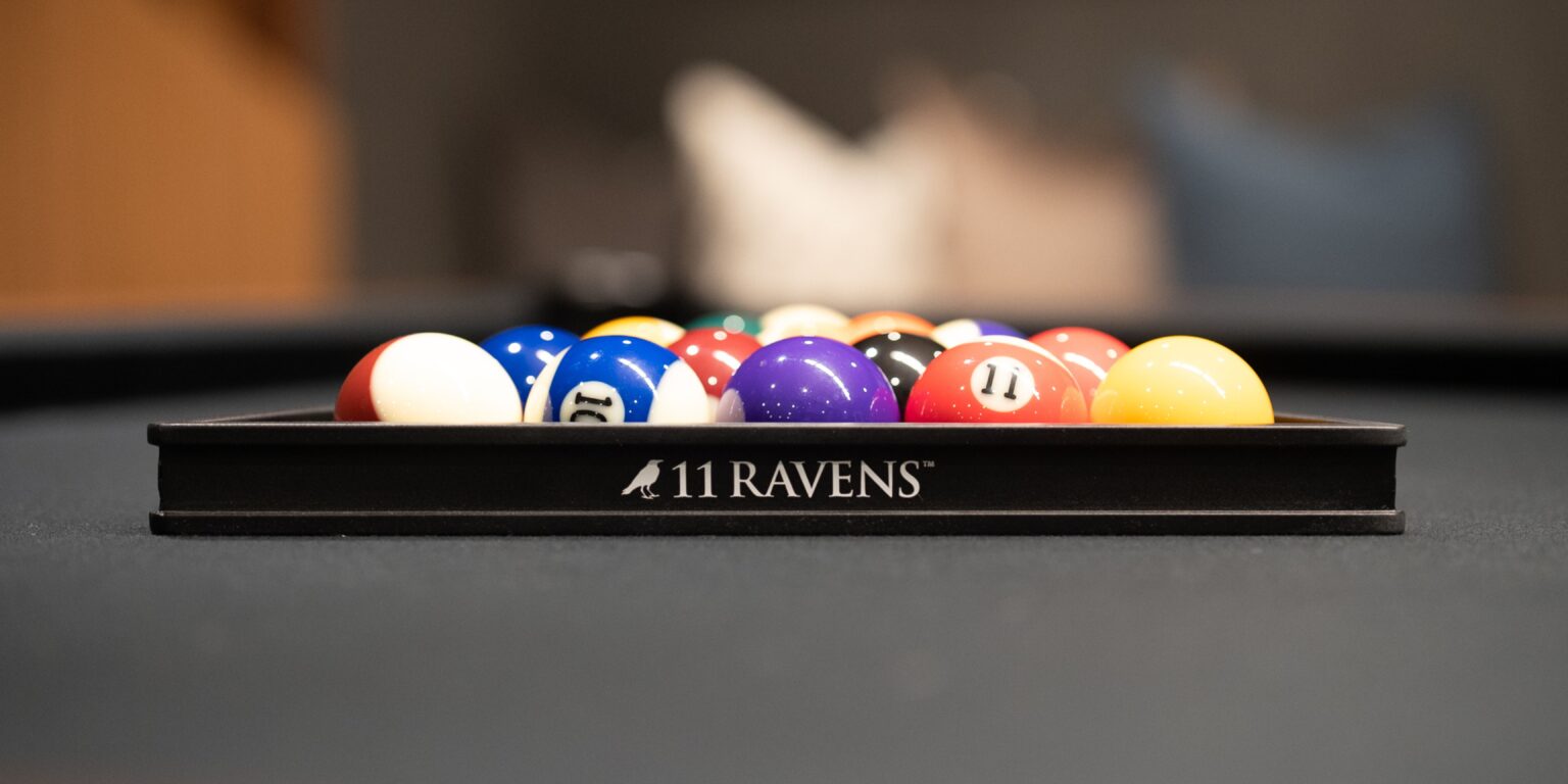 Pool table and balls by 11 Ravens Los Angeles