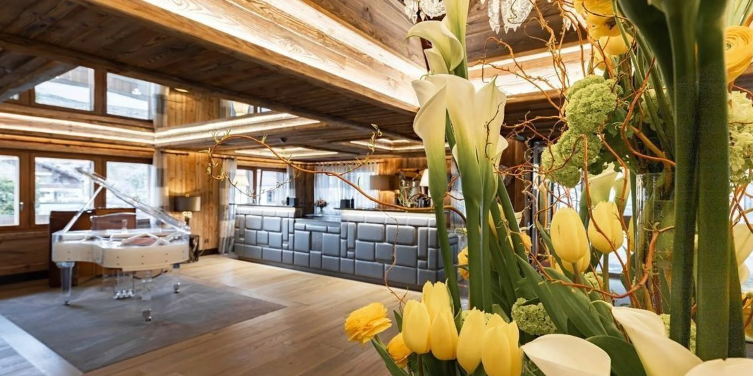 The Transparent Flugel by Edelweiss Pianos in a luxury mountain chalet